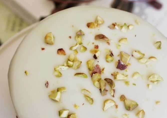 Pistachio White Chocolate Cake. The saltiness of the pistachios combines with the sweet richness of the white chocolate makes this cake taste heavenly!