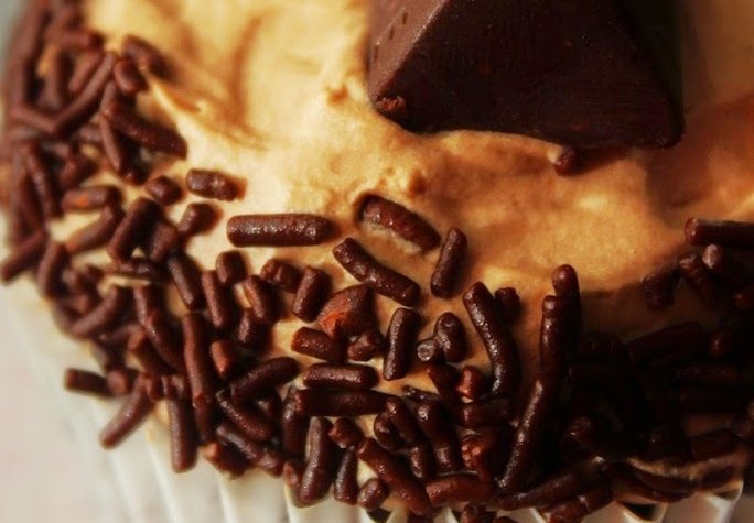 Toblerone Cupcakes. Delicious chocolate cupcakes baked with a mini Toblerone inside and topped with frosting made with melted Toblerone!