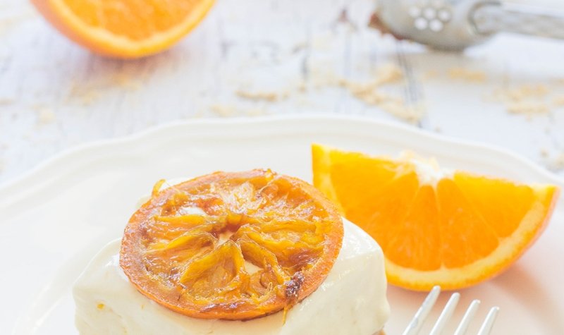No Bake Orange Cheesecake Bars recipe topped with caramelized oranges... Recipe by FlavoursandFrosting.com