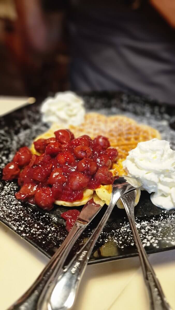 For lunch, Restaurant Café Thiesen is a great choice, offering classic German dishes in a relaxed setting with friendly service. We ordered the schnitzel, which was perfectly crisp and flavorful, followed by waffles with warm cherries for dessert, an absolute highlight.