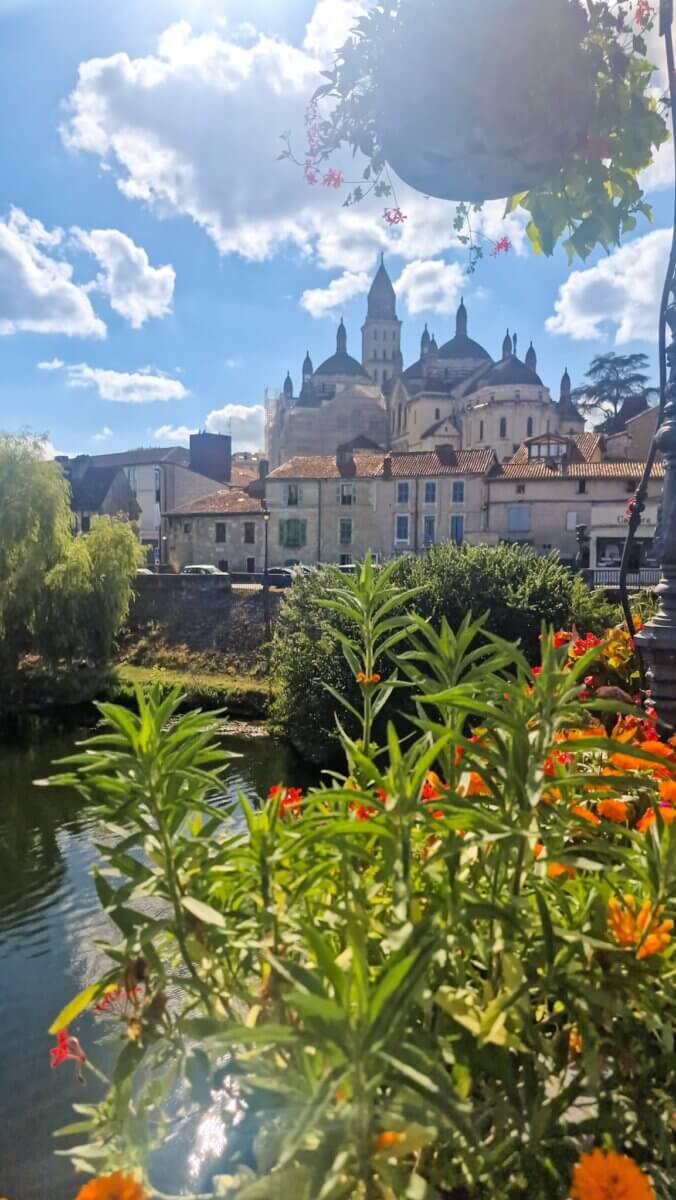 Flowers with the river and Cathedral in the background