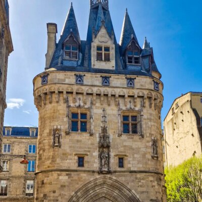 Famous landmark in Bordeaux France called Port Cailhau. It looks like a small castle, but it’s an old city gate.