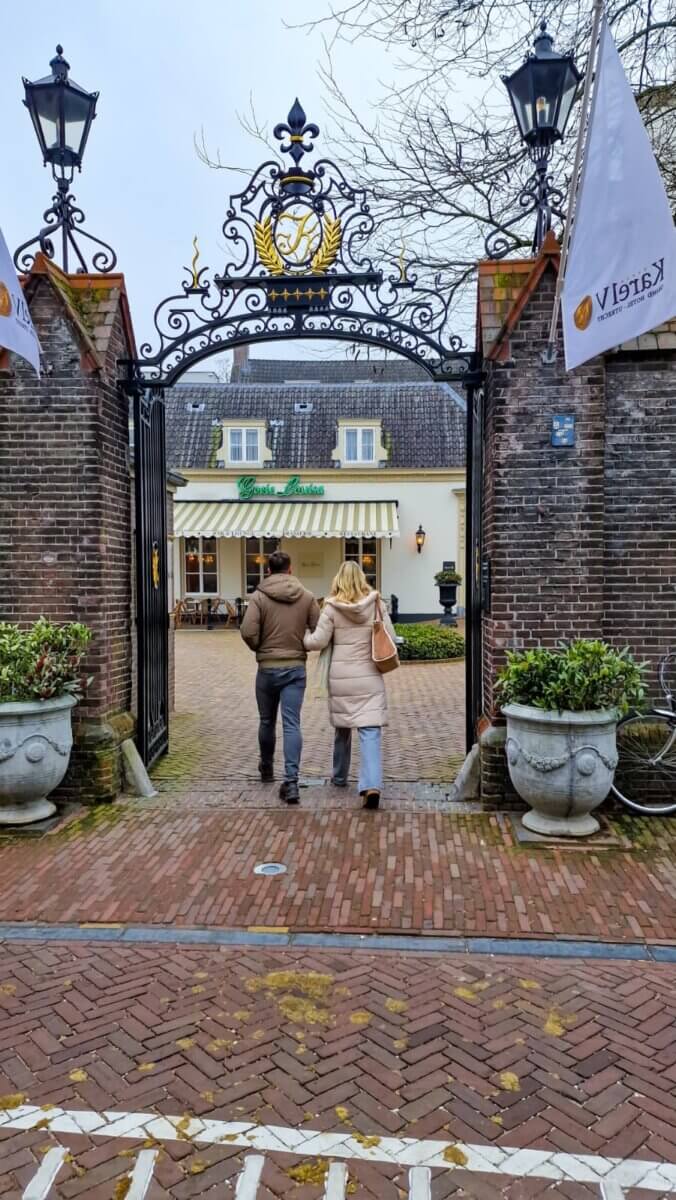 Grand Hotel Karel V in the city center of Utrecht, Netherlands, a historic luxury hotel surrounded by gardens and classic architecture.