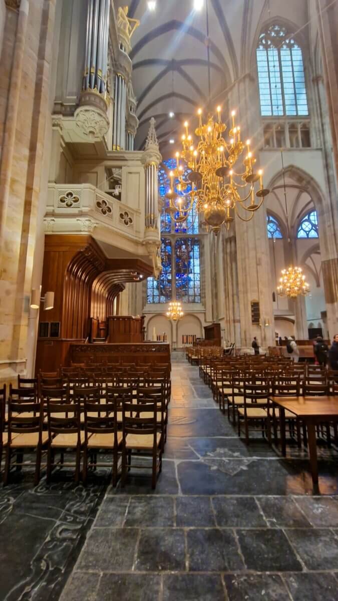 St. Martin's Cathedral (Domkerk) in Utrecht. The church is a Gothic cathedral dedicated to Saint Martin of Tours. The Dom Tower, which is the tallest church tower in the Netherlands, was once connected to the main cathedral but was separated from it by a storm in 1674.