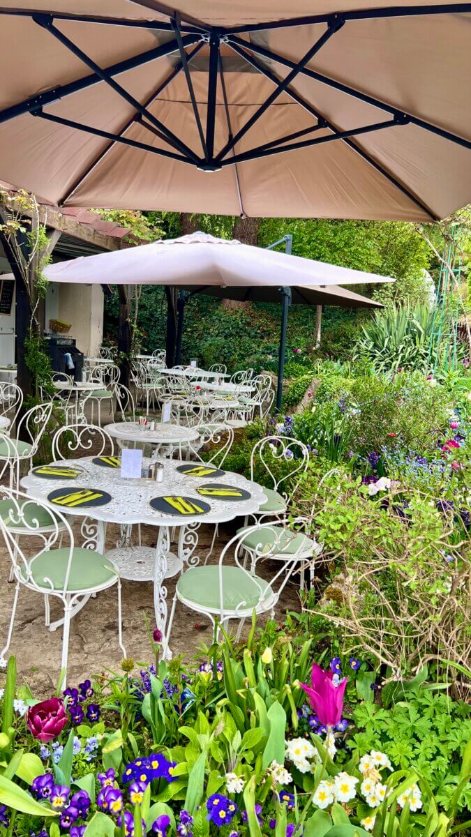 This is the outdoor terrace of Restaurant Les Nympheas in Giverny, France, located opposite Claude Monet's house and gardens.