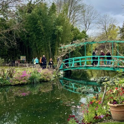 This is a moment in time capturing the Japanese bridge in the water garden of Claude Monet's house and gardens in Giverny, France.