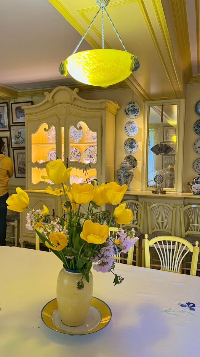 This is a moment captured inside the famous yellow dining room of Claude Monet's house