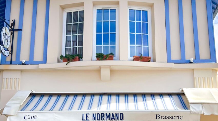 This charming spot is Le Normand, a brasserie and hotel located in the seaside town of Houlgate, in the Normandy region of France