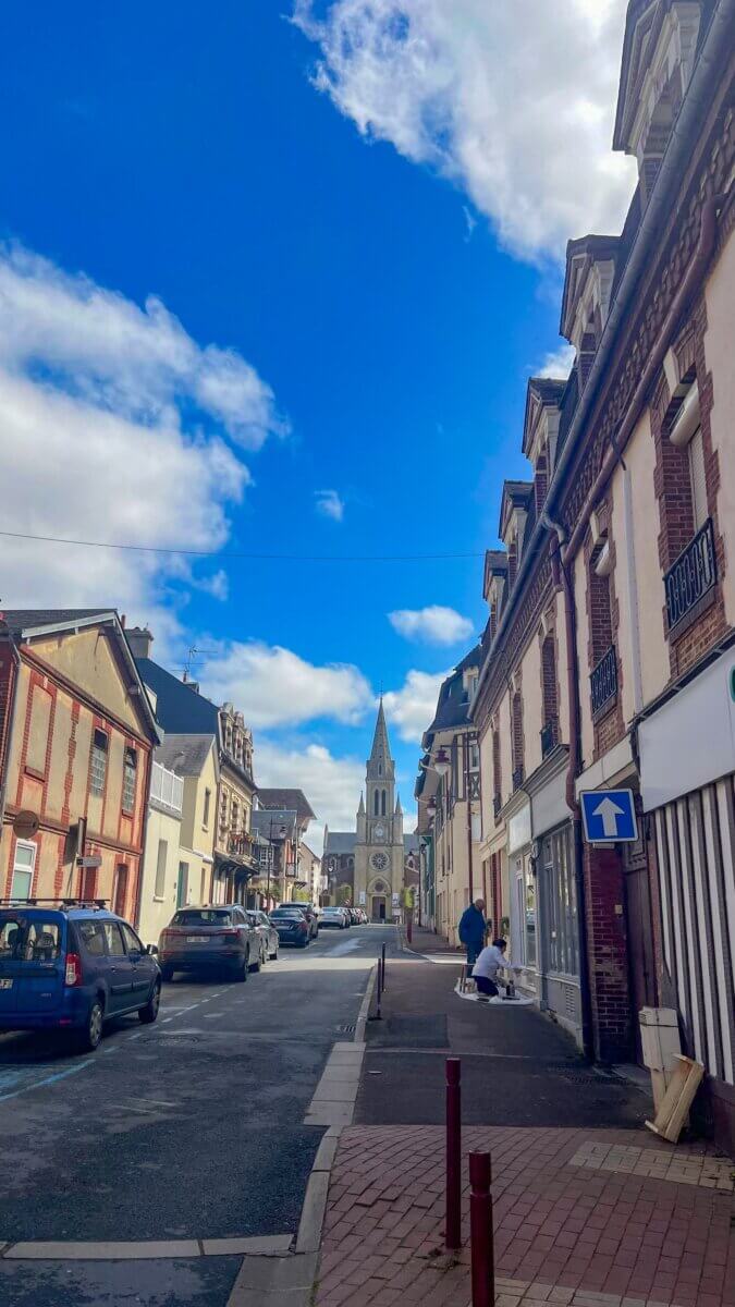 Church in the background in a town in Normandy 